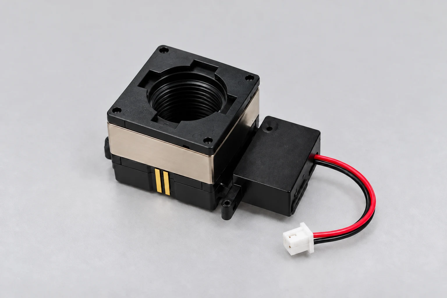 Illustration of a lens actuator with integrated IR-cut filter and red and black leads